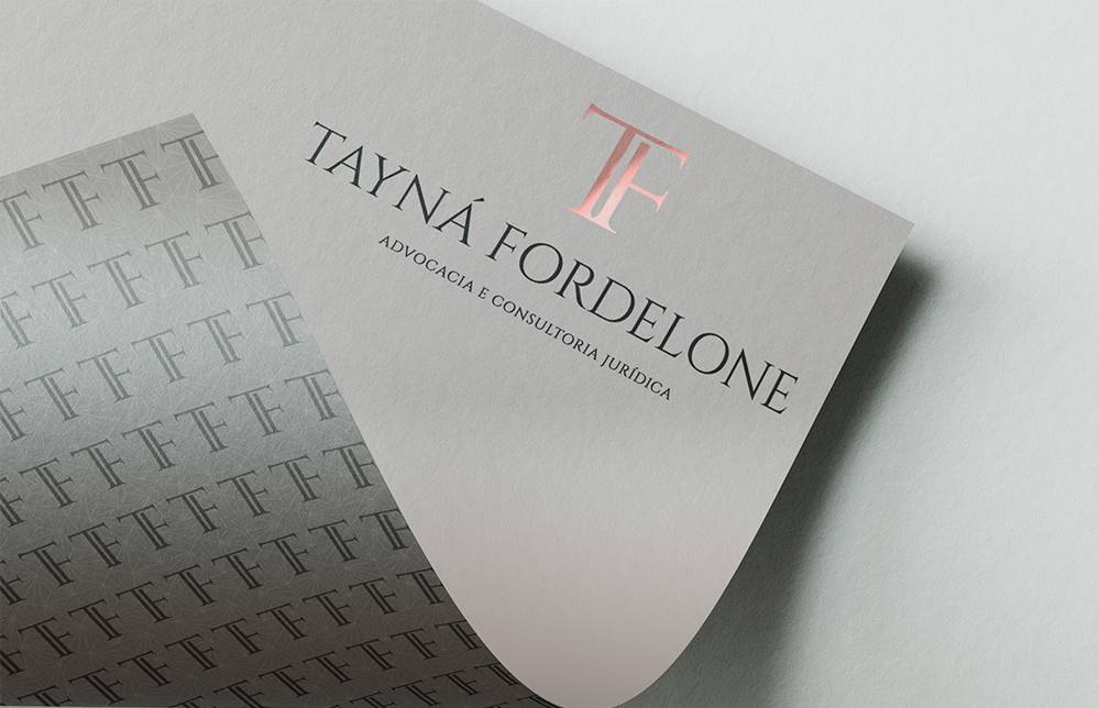 Papel timbrado personalizado com logotipo TF de Taynã Fordelone em impressão metalizada.